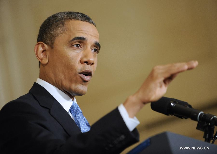 U.S. President Barack Obama holds a press conference in the East Room of the White House in Washington D.C., capital of the United States, Jan. 14, 2013. The United States is making progress in enhancing its fiscal sustainability in the past years as a result of government spending cuts and more government revenue, Obama said here on Monday. (Xinhua/Zhang Jun) 