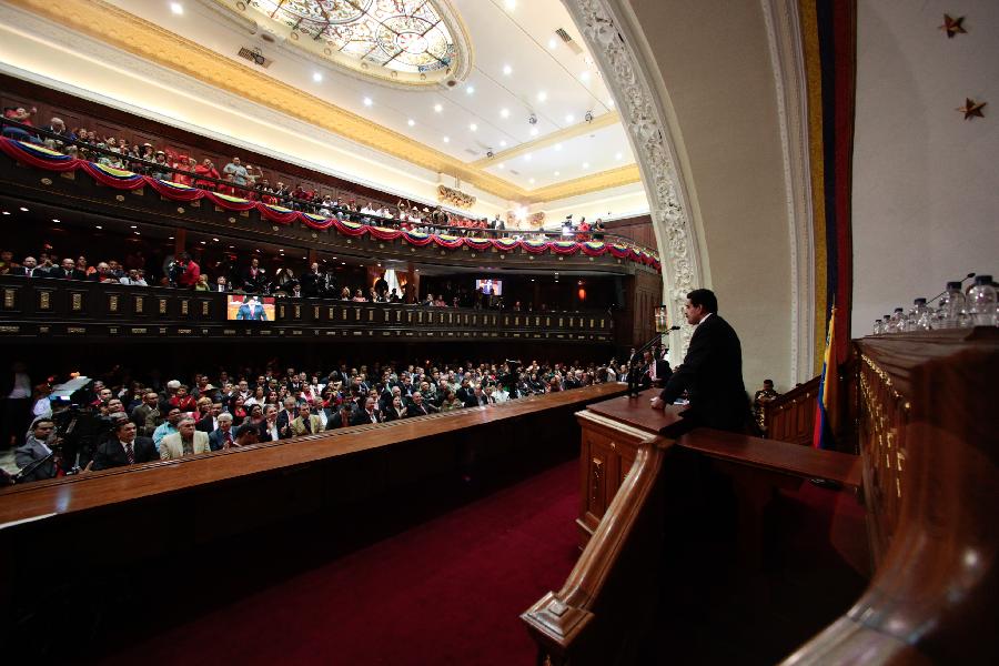 Image provided by Venezuela's Presidency of Venezuelan shows Vice President Nicolas Maduro (R) delivering the state of nation address to National Assembly in Caracas, Venezuela, on Jan. 15, 2013. Nicolas Maduro submitted the report in writing from ailing President Hugo Chavez who is receiving treatment in Cuba. (Xinhua/Venezuela's Presidency)  