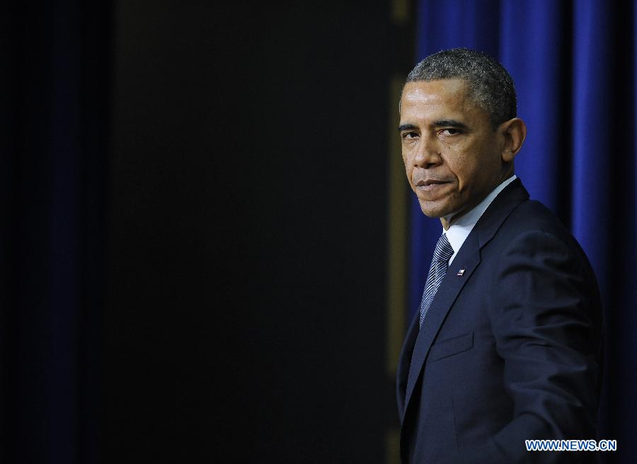 U.S. President Barack Obama attends an event on gun violence reduction proposals at the White House in Washington D.C., capital of the United States, Jan. 16, 2013. Obama on Wednesday unveiled a sweeping and expansive package of gun violence reduction proposals, a month after the Sandy Hook Elementary School mass shooting killed 26 people including 20 schoolchildren. (Xinhua/Zhang Jun)