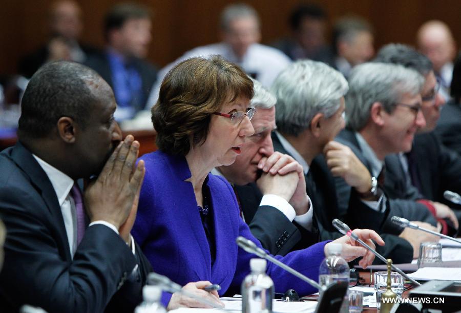 Mali's Foreign Minister Tieman Hubert Coulibaly (1st L) and EU Foreign Policy chief Catherine Ashton (2nd L) attend an European Union emergency foreign ministers' meeting to discuss the situation in Mali, in Brussels, capital of Belgium, on Jan. 17, 2013. (Xinhua/Zhou Lei)
