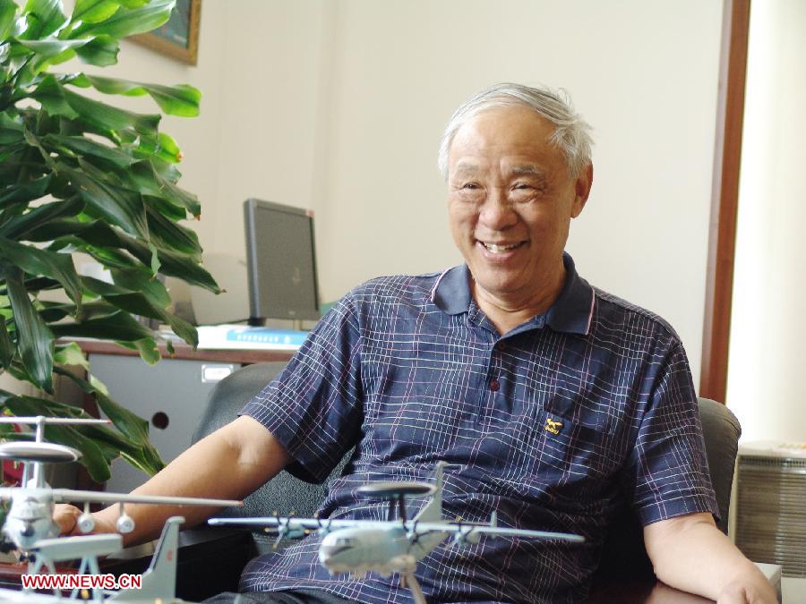 File photo taken in May, 2011 shows Wang Xiaomo in his office. Radar engineer Wang Xiaomo won China's top science award on Friday. Wang, 74, is a Chinese Academy of Engineering (CAE) member who has been engaged in the research and design of radar for the past 30 years. He is regarded as "father" of airborne warning and control systems in China. (Xinhua) 
