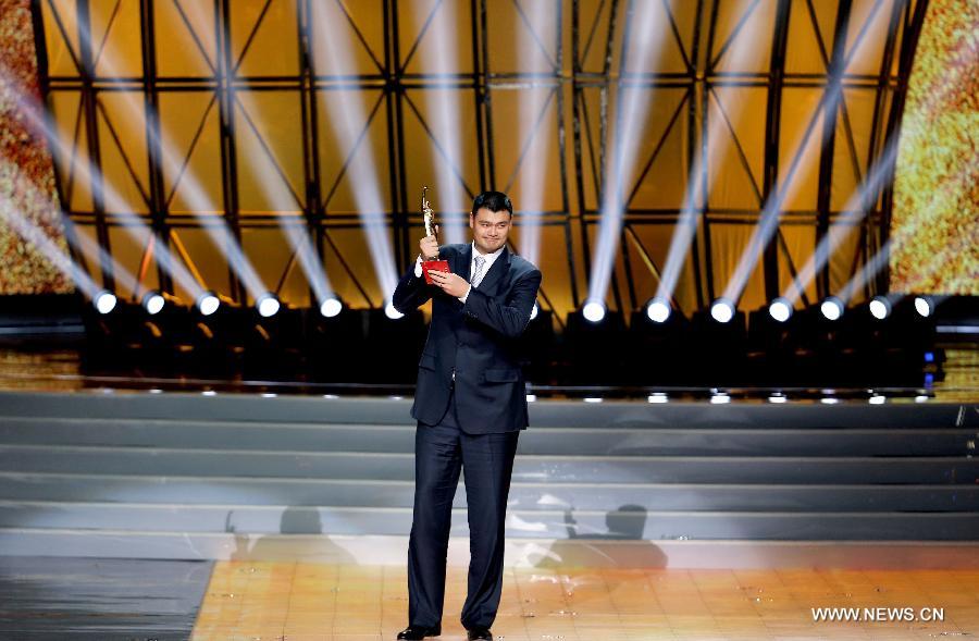 China's basketball player Yao Ming is awarded Judging Committee's special award during the ceremony of 2012 CCTV Sports Personality of the year in Beijing, China, Jan. 19, 2013. (Xinhua/Li Ying)