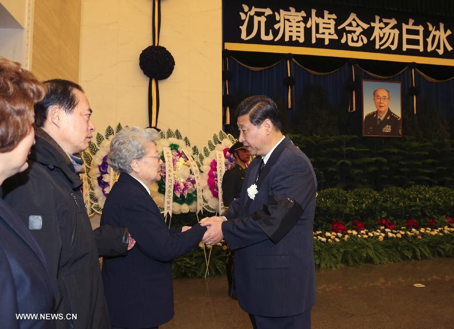 Xi Jinping (1st R) shakes hands with a relative of Yang Baibing, at the Babaoshan Revolutionary Cemetery in Beijing, capital of China, Jan. 21, 2013. The body of Yang Baibing, former director of the General Political Department of the Chinese People's Liberation Army (PLA), was cremated in Beijing on Monday. Yang, also former secretary-general of the Central Military Commission, passed away due to illness on Jan. 15. He was 93. (Xinhua/Wang Jianmin)