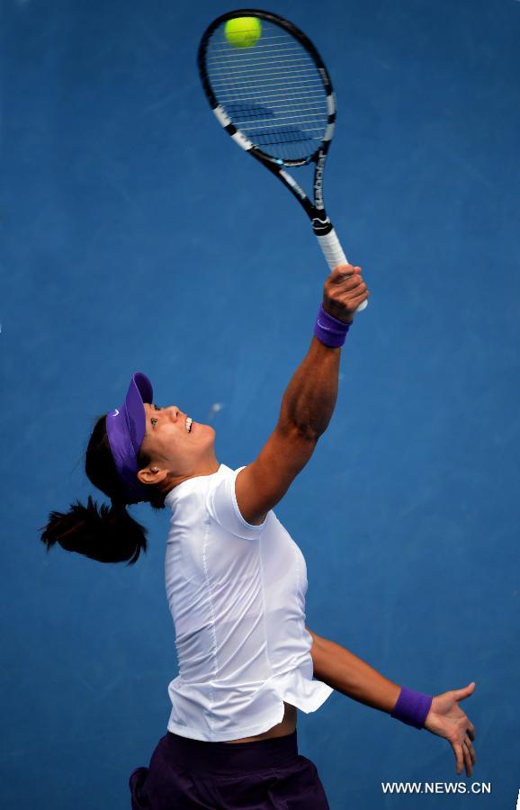 China's Li Na serves to Poland's Agnieszka Radwanska during a women's singles quarterfinal match at the Australian Open tennis tournament in Melbourne on Jan. 22, 2013. Li Na won 2-0 and entered the semifinals. (Xinhua/Chen Xiaowei) 