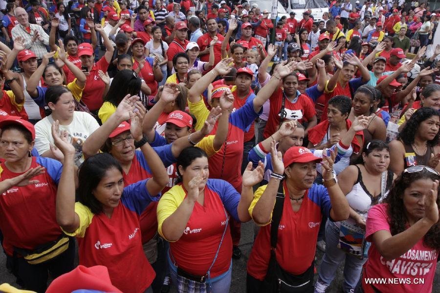 Supporters of Venezuelan President Hugo Chavez attend a rally to commemorate the 55th anniversary of democracy, in Caracas, capital of Venezuela, on Jan. 23, 2013. (Xinhua/Gregorio Teran/AVN) 