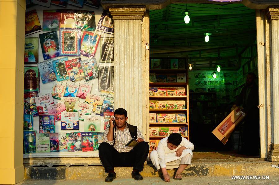 People attend the 44th Cairo International Book Fair in Cairo, Egypt, Jan. 23, 2013. (Xinhua/Qin Haishi)