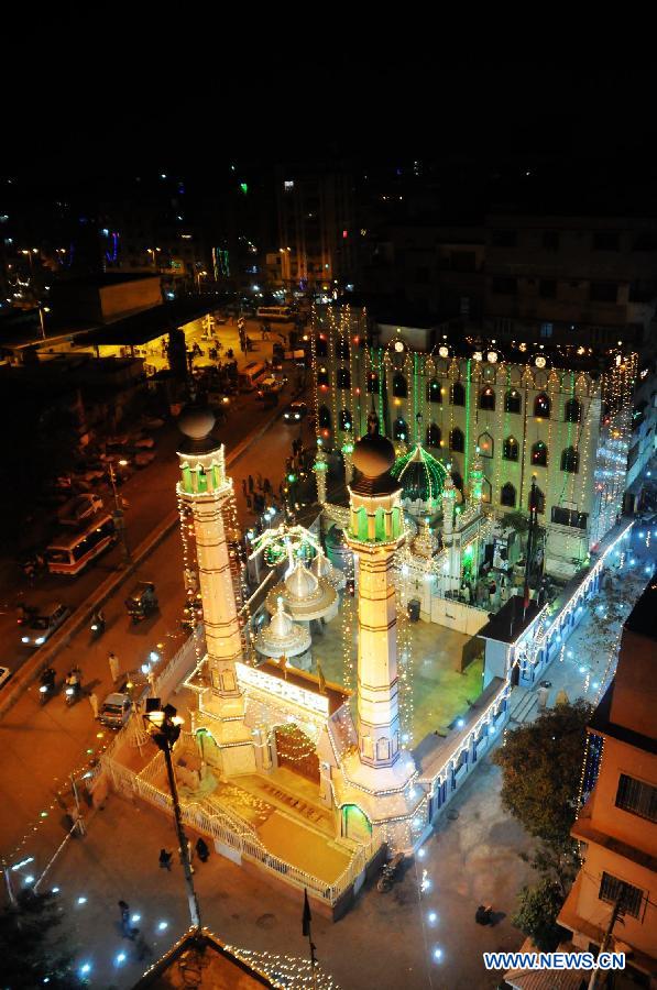 An illuminated mosque is seen during celebrations ahead of Eid-e-Milad-un-Nabi, marking the birth of the Prophet Mohammed, the founder of Islam, in southern Pakistani port city of Karachi on Jan. 24, 2013. Pakistani Muslims will celebrate the birth of the Prophet Mohammed on Jan. 25. (Xinhua/Masroor)