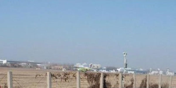 The prototype of China's first indigenously-developed heavy transport aircraft, Y-20, prepares to take off from an unidentified airport for its first test flight Saturday afternoon, January 26, 2013. (Photo/People's Daily)