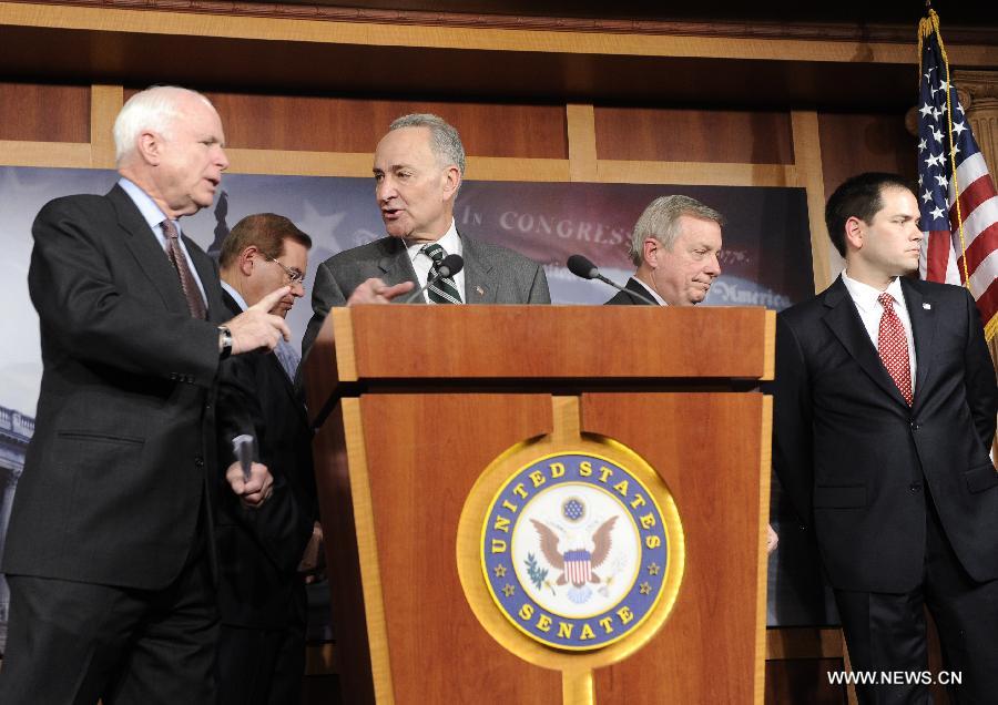 (L to R) U.S. Senators John McCain (R-AZ), Robert Menendez (D-NJ), Charles Schumer (D-NY), Richard Durbin (D-IL) and Marco Rubio (R-FL) attend a press conference on bipartisan framework for comprehensive immigration reform on Capitol Hill, in Washington D.C., capital of the United States, Jan. 28, 2013. (Xinhua/Zhang Jun) 