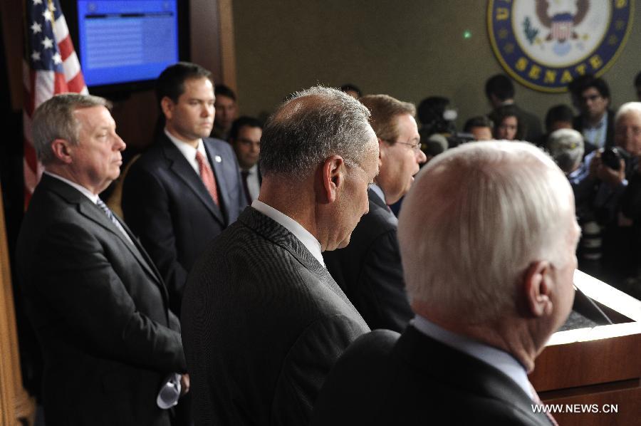 (R to L) U.S. Senators John McCain (R-AZ), Robert Menendez (D-NJ), Charles Schumer (D-NY), Richard Durbin (D-IL) and Marco Rubio (R-FL) attend a press conference on bipartisan framework for comprehensive immigration reform on Capitol Hill, in Washington D.C., capital of the United States, Jan. 28, 2013. (Xinhua/Zhang Jun) 