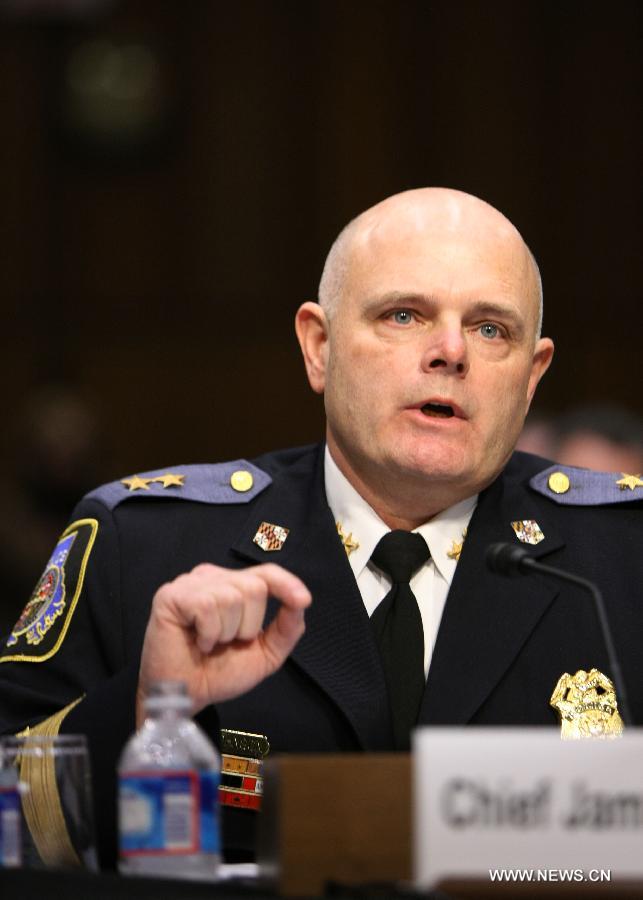 Baltimore County Police Department Chief James Johnson speaks during the hearing for a Senate Judiciary Committee about gun control on Capitol Hill in Washington D.C., the United States, Jan. 30, 2013. (Xinhua/Fang Zhe) 