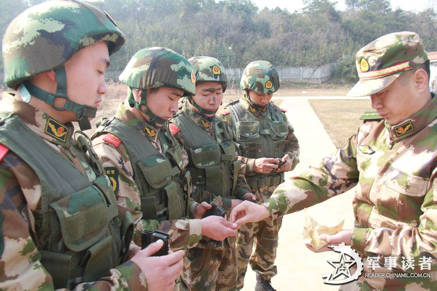 Snipers of the Huzhou Detachment under the Zhejiang Contingent of the Chinese People's Armed Police Force (APF) carry out military training before Spring Festival. (China Military Online/He Yuanhong, Wang Shichun)