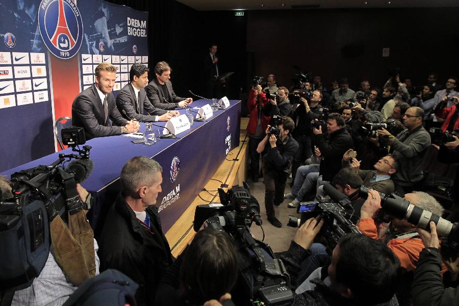 Soccer player David Beckham (L) attends a news conference in Paris January 31, 2013. Former England captain David Beckham has joined Paris St Germain on a five-month contract, the French Ligue 1 club said on Thursday. Sitting with Beckham are Nasser Al-Khelaifi (C), Paris St Germain's club owner and owner of Qatari TV channel Al Jazeera Sport, President of beIN Sport French TV channel, and at Paris St-Germain sports director Leonardo (R). ( Photo: Xinhua/Reuters)