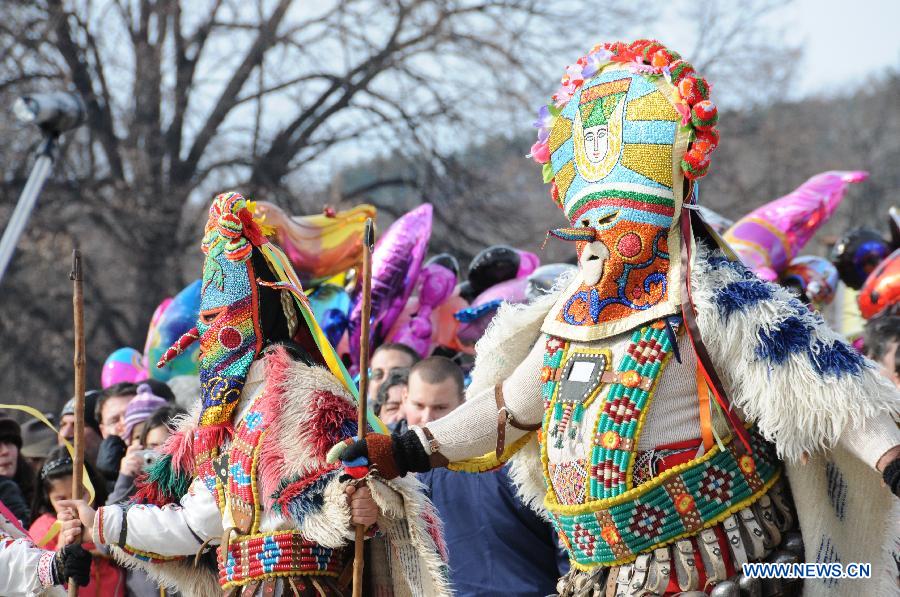 Performers parade with masks during a celebration of the International Mask Festival in Pelnik in Bulgaria, Feb. 2, 2013. All together 6,092 performers from 11 countries and regions participated in this year's festival.(Xinhua/Chen Hang) 