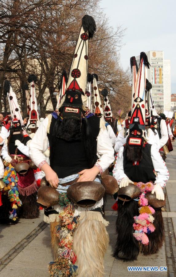 Performers parade with masks during a celebration of the International Mask Festival in Pelnik in Bulgaria, Feb. 2, 2013. All together 6,092 performers from 11 countries and regions participated in this year's festival.(Xinhua/Chen Hang) 