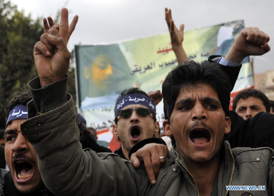 Protestors shout slogans during a demonstration requiring the government to provide medical treatment to protestors who were wounded during the 2011 uprising in Sanaa, Yemen, on Feb. 3, 2013. (Xinhua/Mohammed Mohammed)