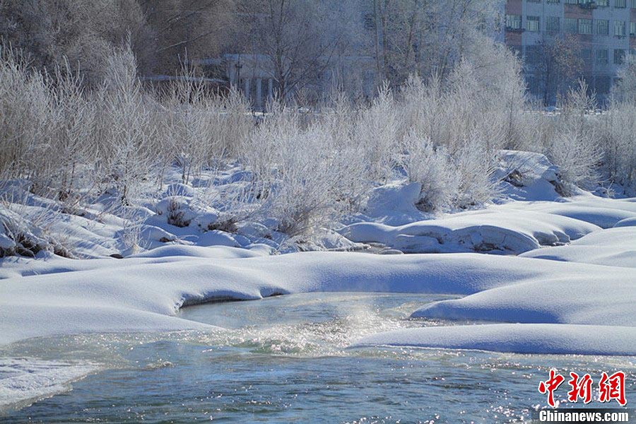 Photo shows the winter scenery of Kelan River at Altay County in Xinjiang Uygur Autonomous Region. (Photo/ Huang Xiaoming)