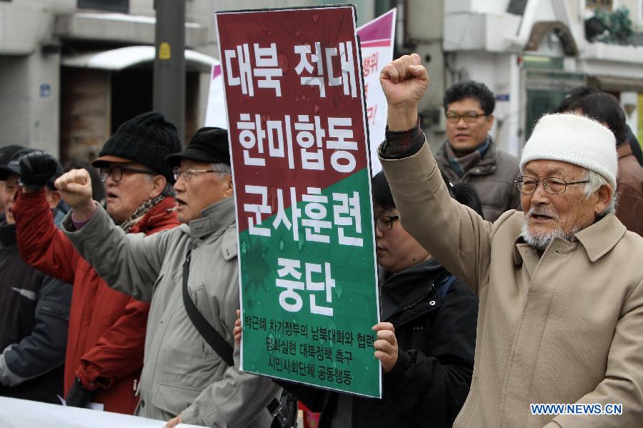South Korean activitists attend a demonstration to protest against the joint naval military drill between South Korea and the United States in Seoul, South Korea, Feb. 5, 2013. South Korea and the United States launched a three-day joint naval military drill Monday in a show of force as speculation abounds over a potential nuclear test by the Democratic People's Republic of Korea (DPRK). (Xinhua/Park Jin-hee)