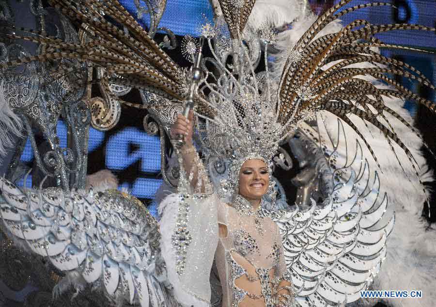 A contestant performs during the Carnival Queen pageant in Santa Cruz, Spain, Feb. 6, 2013. (Xinhua/Xie Haining)