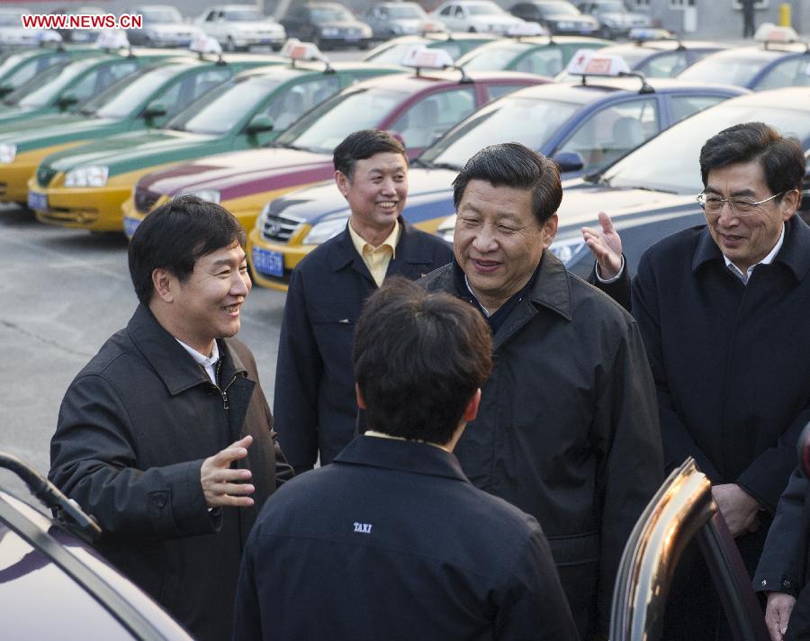 Xi Jinping (2nd R), general secretary of the Communist Party of China (CPC) Central Committee and chairman of the CPC Central Military Commission, meets with a taxi driver at Xianglong taxi company in Beijing, capital of China, Feb. 8, 2013. Xi Jinping on Friday visited and extended greetings to laborers including subway construction workers, sanitation workers, police officers and taxi drivers in Beijing, ahead of the Chinese traditional Spring Festival, which starts on Feb. 10 this year. (Xinhua/Wang Ye) 