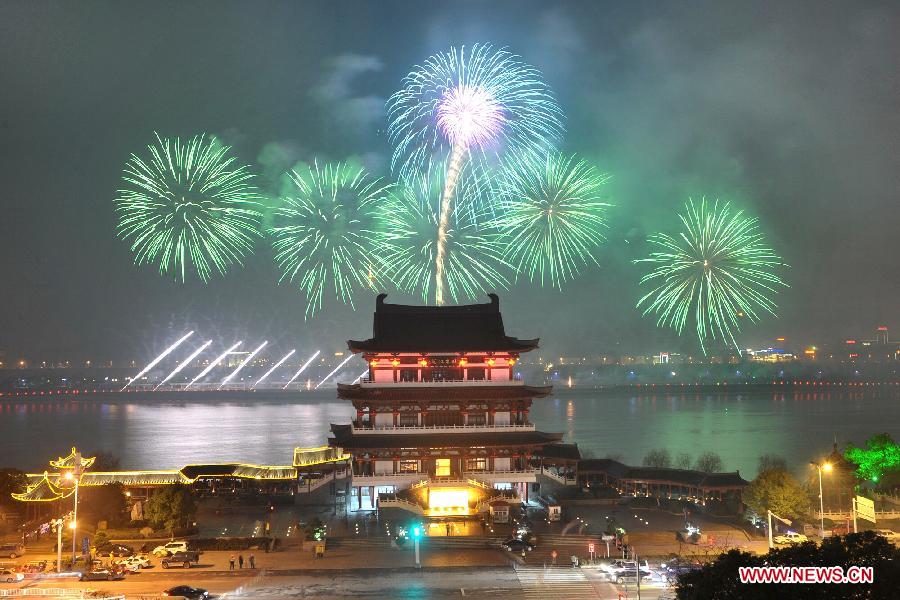 Fireworks paint the skyline at the Chinese Lunar New Year Eve over Changsha, capital of central China's Hunan Province, on Feb. 9, 2013. The Chinese Lunar New Year, or the Spring Festival, begins on Feb. 10 this year and marks the start of the Year of the Snake, according to the Chinese zodiac. (Xinhua/Long Hongtao) 