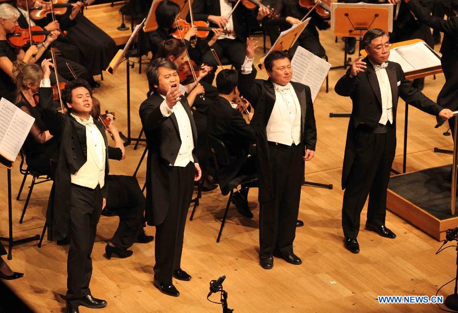 Chinese tenors perform during a concert celebrating the Chinese lunar New Year, in Melbourne, Australia, Feb. 10, 2013. The Chinese Spring Festival falls on Feb. 10 this year, marking the start of the Chinese Year of the Snake. (Xinhua/Xu Yanyan)