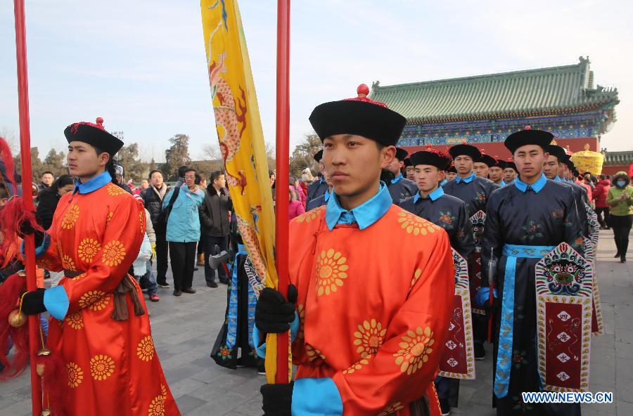 Performers wearing costumes of the Qing Dynasty (1644-1911) act during a performance presenting the ancient royal heaven worship ceremony in the Temple of Heaven in Beijing, capital of China, Feb. 10, 2013. The Temple of Heaven, first built in 1420 and used to be the imperial sacrificial altar during the Ming (1368-1644) and Qing dynasties, held reenaction of the ancient royal ritual for the worship of the heaven on Sunday, the first day of Chinese Lunar Year of the Snake. The performance will also be given in the next four days. (Xinhua/Liang Zhiqiang) 