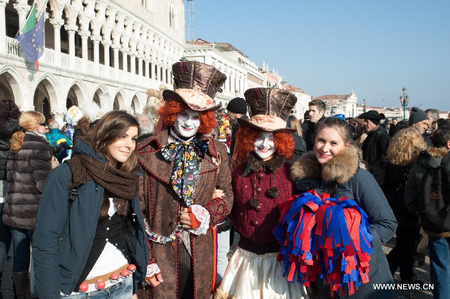 Costumed revellers participate in the carnival in Venice, Italy, on Feb. 10, 2013. The 18-day 2013 Venice carnival will end on Feb. 12. (Xinhua/Huang Xiaozhe) 