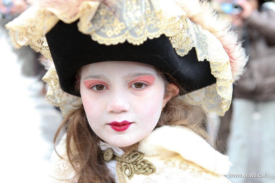 A costumed reveller participates in the carnival in Venice, Italy, on Feb. 10, 2013. The 18-day 2013 Venice carnival will end on Feb. 12. (Xinhua/Huang Xiaozhe) 