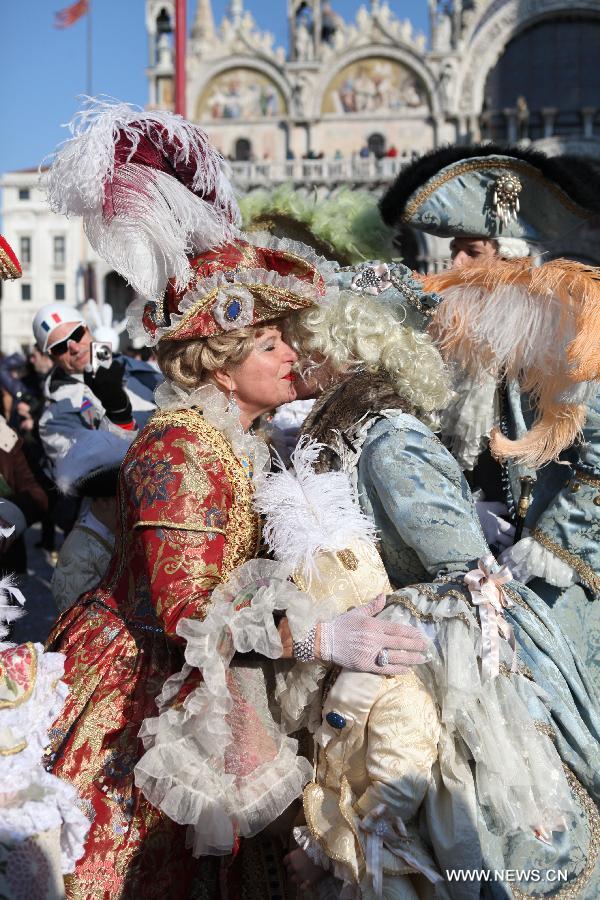 Costumed revellers participate in the carnival in Venice, Italy, on Feb. 10, 2013. The 18-day 2013 Venice carnival will end on Feb. 12. (Xinhua/Huang Xiaozhe) 