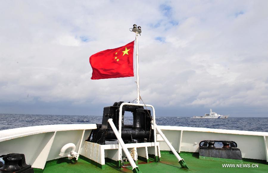 Chinese marine surveillance ship Haijian 137 carries out a regular patrol in waters surrounding the Diaoyu Islands on Feb. 14, 2013. The fleet of Chinese marine surveillance ships continued regular patrol surrounding the Diaoyu Islands during the Spring Festival holiday. (Xinhua/Zhang Jiansong) 