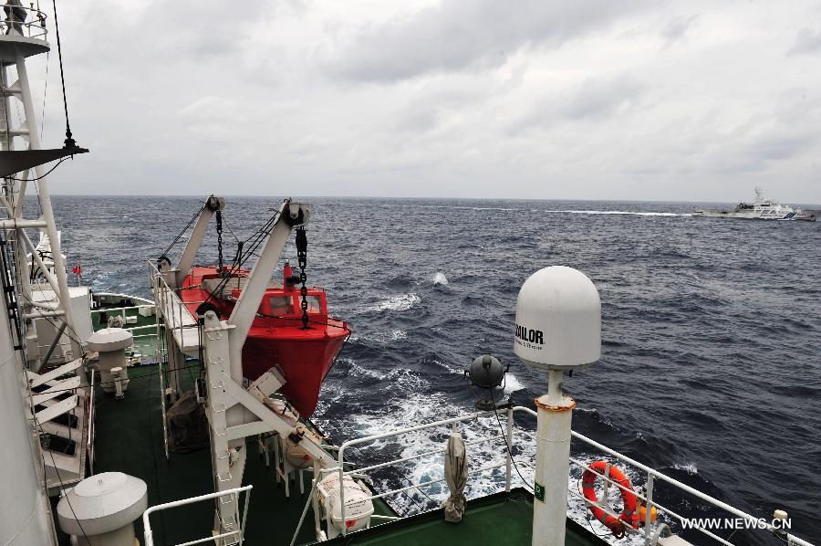 Chinese marine surveillance ship Haijian 137 carries out a regular patrol in waters surrounding the Diaoyu Islands on Feb. 14, 2013. The fleet of Chinese marine surveillance ships continued regular patrol surrounding the Diaoyu Islands during the Spring Festival holiday. (Xinhua/Zhang Jiansong) 