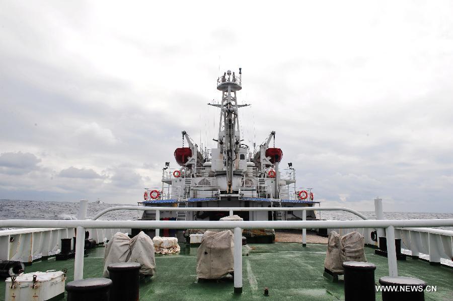 Chinese marine surveillance ship Haijian 137 carries out a regular patrol in waters surrounding the Diaoyu Islands on Feb. 14, 2013. The fleet of Chinese marine surveillance ships continued regular patrol surrounding the Diaoyu Islands during the Spring Festival holiday. (Xinhua/Zhang Jiansong) 