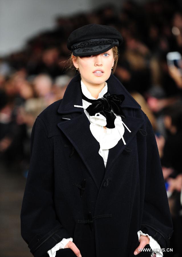 A model presents a creation of Ralph Lauren at the 2013 Fall collection of the Mercedes-Benz Fashion Week in New York, Feb. 14, 2013. (Xinhua/Deng Jian) 