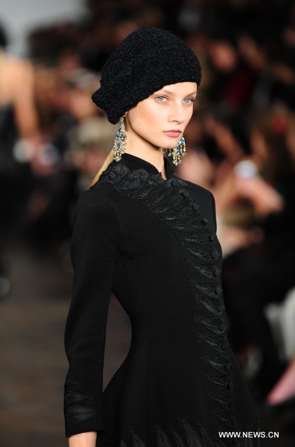 A model presents a creation of Ralph Lauren at the 2013 Fall collection of the Mercedes-Benz Fashion Week in New York, Feb. 14, 2013. (Xinhua/Deng Jian) 