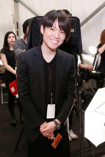 Designer Brandon Sun poses at the Brandon Sun Fall 2013 fashion show presentation during Mercedes-Benz Fashion Week at The Box at Lincoln Center on February 13, 2013 in New York City. (CCTV.com)