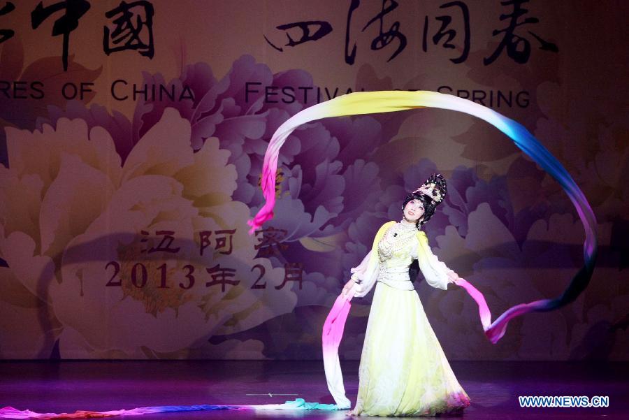 Beijing Opera performer Ding Xiaojun dances during the "Cultures of China, Festival of Spring" event celebrating the Chinese lunar New Year, in Miami, the United States, Feb. 15, 2013. Chinese artists, organized by the Overseas Chinese Affairs Office of the Chinese State Council as one of the "Cultures of China, Festival of Spring" performance groups sent abroad to celebrate the Chinese lunar new year every year, presented their show to overseas Chinese people in Miami on Friday. (Xinhua/Fang Zhe)