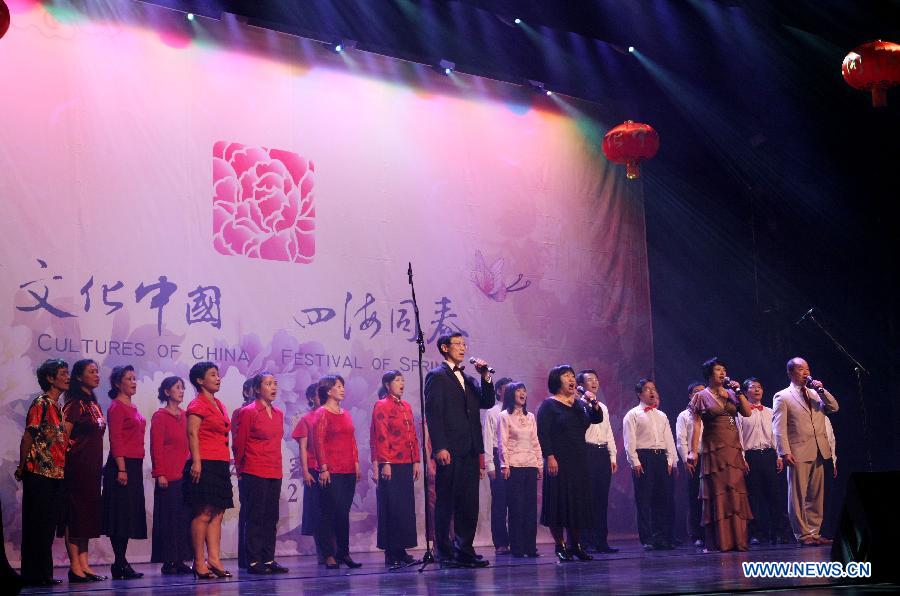 A chorus of the local Chinese community perform during the "Cultures of China, Festival of Spring" event celebrating the Chinese lunar New Year, in Miami, the United States, Feb. 15, 2013. Chinese artists, organized by the Overseas Chinese Affairs Office of the Chinese State Council as one of the "Cultures of China, Festival of Spring" performance groups sent abroad to celebrate the Chinese lunar new year every year, presented their show to overseas Chinese people in Miami on Friday. (Xinhua/Fang Zhe)