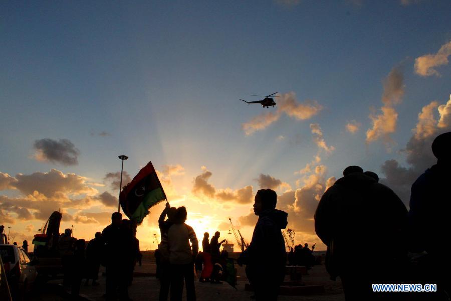 Libyan people attend a celebration for the second anniversary of the uprising that toppled the regime of strongman Muammar Gaddafi in Benghazi, on Feb. 17, 2013. (Xinhua/Mohammed El Shaiky) 