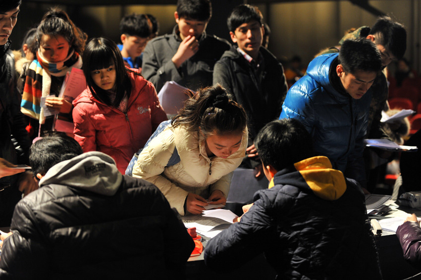 The photo shows the enrollment site of Beijing Film Academy on Feb. 18, 2013. Beijing Film Academy plans to recruit 513 new students in 25 professional directions in 2013. Candidates should first submit online application and confirm on site. The online application has started since Jan. 10, 2013. The registration confirmation started on Feb. 17, 2013. (Photo/People’s Daily Online)