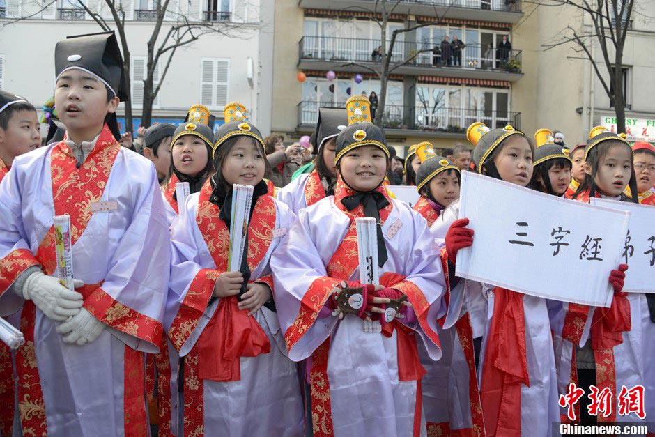 Children in costumes of ancient China participate in a parade to celebrate the traditional Chinese Lunar New Year in Paris, France, February 17, 2013. (CNS/Long Jianwu)