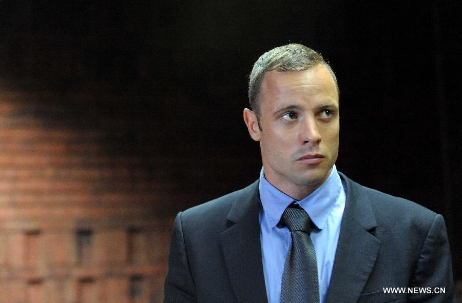 South African Olympic sprinter Oscar Pistorius appears at the Magistrate's Court to hear judgment on his bail application in Pretoria, South Africa, on Feb. 19, 2013. This was the second time that Pistorius appeared in court since he was arrested last Thursday for allegedly shooting model Reeva Steenkamp at his Pretoria home. (Xinhua/Li Qihua) 