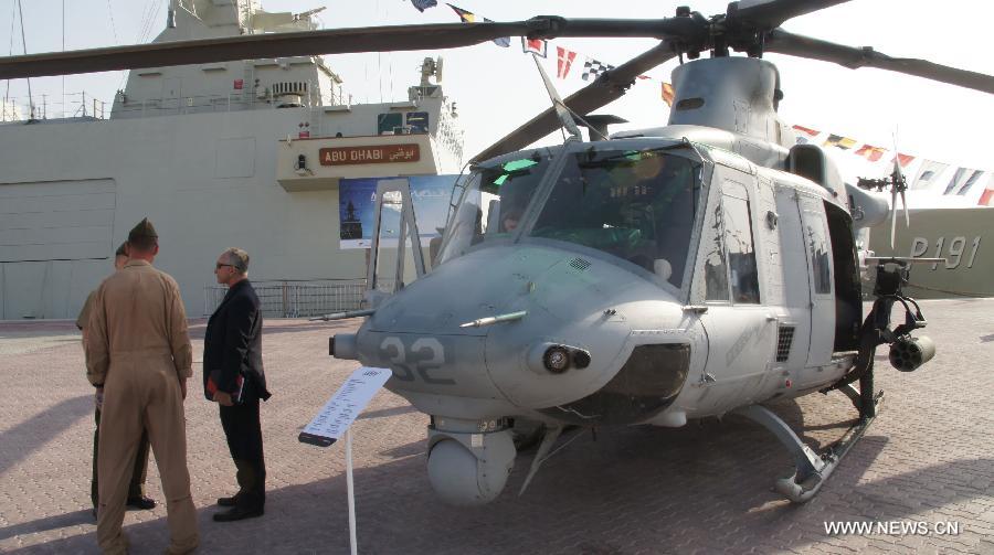 A "Venom" military helicopter is displayed during NAVDEX in Abu Dhabi, the United Arab Emirates, on Feb. 19, 2013. The biennial International Defense Exhibition and Conference (IDEX) 2013, which starts here on Feb. 17, doubled in size compared to 2011 and puts this year a special focus on naval defense and unmanned aerial systems. This year's IDEX hosts NAVDEX, a special platform for the navy ships. (Xinhua/An Jiang) 