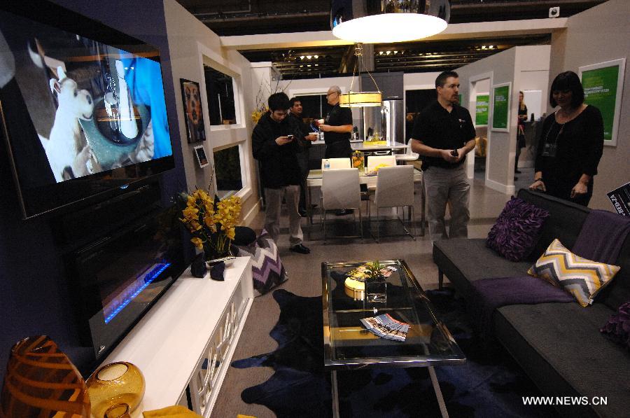 People visit the 2013 Home and Garden Show held in Vancouver, Canada, Feb. 20, 2013. The 5-day event kicked off on Wednesday.(Xinhua/Sergei Bachlakov)  