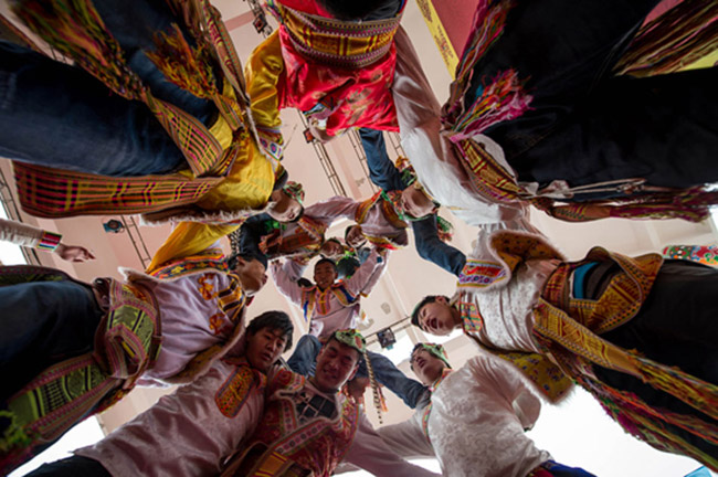 People of Tibetan nationality celebrate their traditional festival “Shang Jiu Day” in a village in Sichuan on Feb. 18, 2013. (Photo/Xinhua)