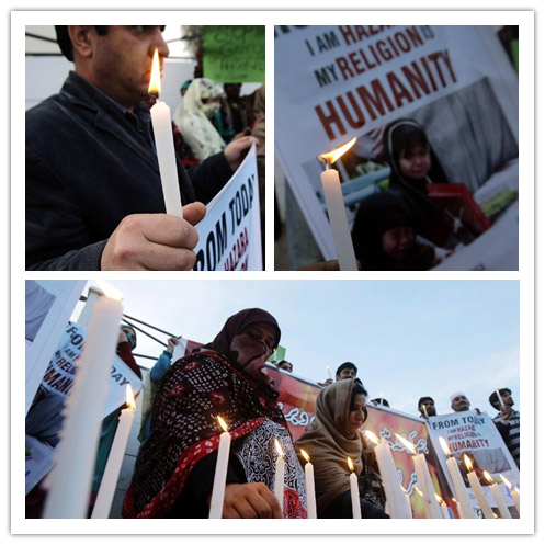 Pakistani civil activists hold candle during a candlelight vigil for the victims of the deadly blast in Quetta killing 87 people last Saturday, in northwest Pakistan's Peshawar, Feb. 19, 2013. (Xinhua Photo/Umar Qayyum)