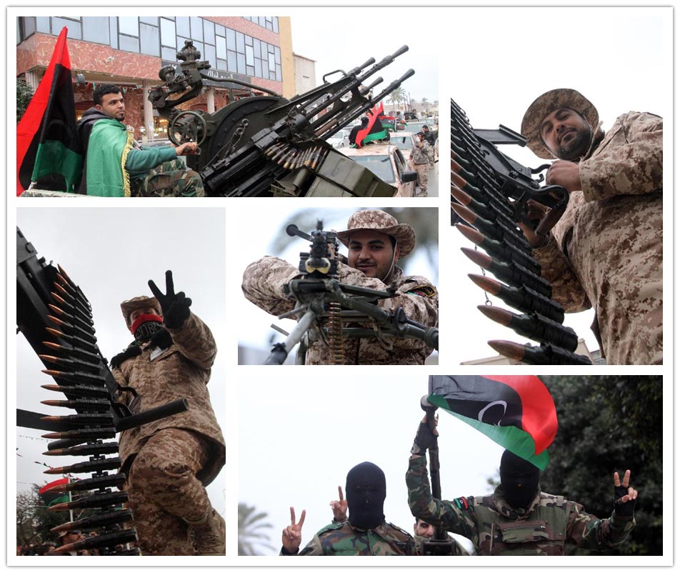 Libyan soldiers demonstrate their skills during a military parade for the second anniversary of a political upheaval that toppled former leader Muammar Gaddafi in the Libyan capital Tripoli, on Feb. 21, 2013. (Xinhua/Hamza Turkia) 