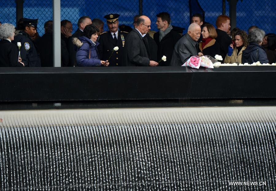 Family members of victims of the 1993 World Trade Center bombing attack participate in the 20th anniversary ceremony at Ground Zero in New York City on Feb. 26, 2013. The bomb explosion with the force of an earthquake rocked the building, killing 6 people and injuring more than 1,000. (Xinhua/Wang Lei) 