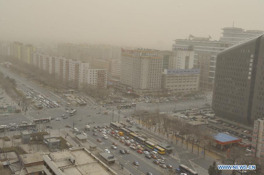 Photo taken on Feb. 28, 2013 shows the fog-shrouded Xuanwumen area in downtown Beijing, capital of China. Beijing was hit by heavy fog on Thursday morning. The fog led to reduced visibility and degenerated air quality. The city also issued high wind and haze alerts on the same day. (Xinhua/Lu Peng)