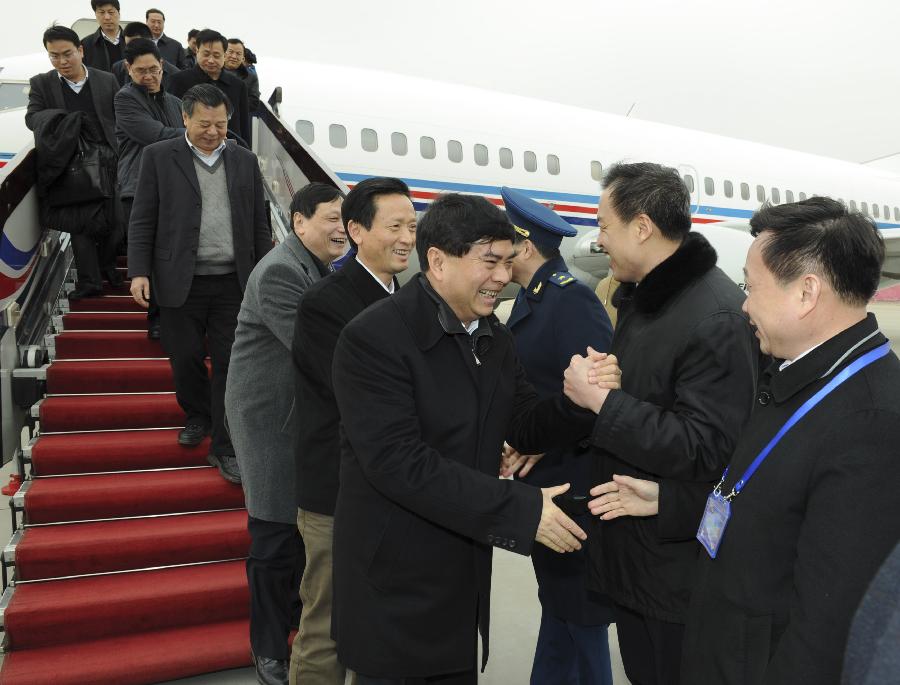 Deputies to the 12th National People's Congress (NPC) from east China's Jiangxi Province arrive in Beijing, capital of China, March 2, 2013. The first session of the 12th NPC is scheduled to open in Beijing on March 5. (Xinhua/Xie Huanchi)